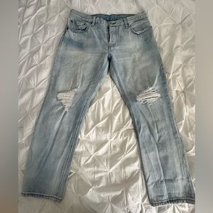 Levi’s 501 ripped jeans